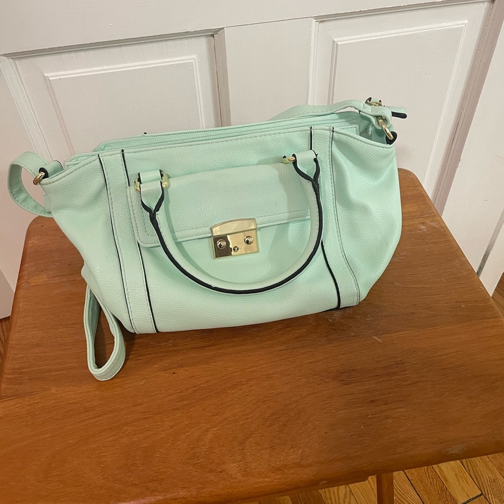 Gently used crossbody bag.